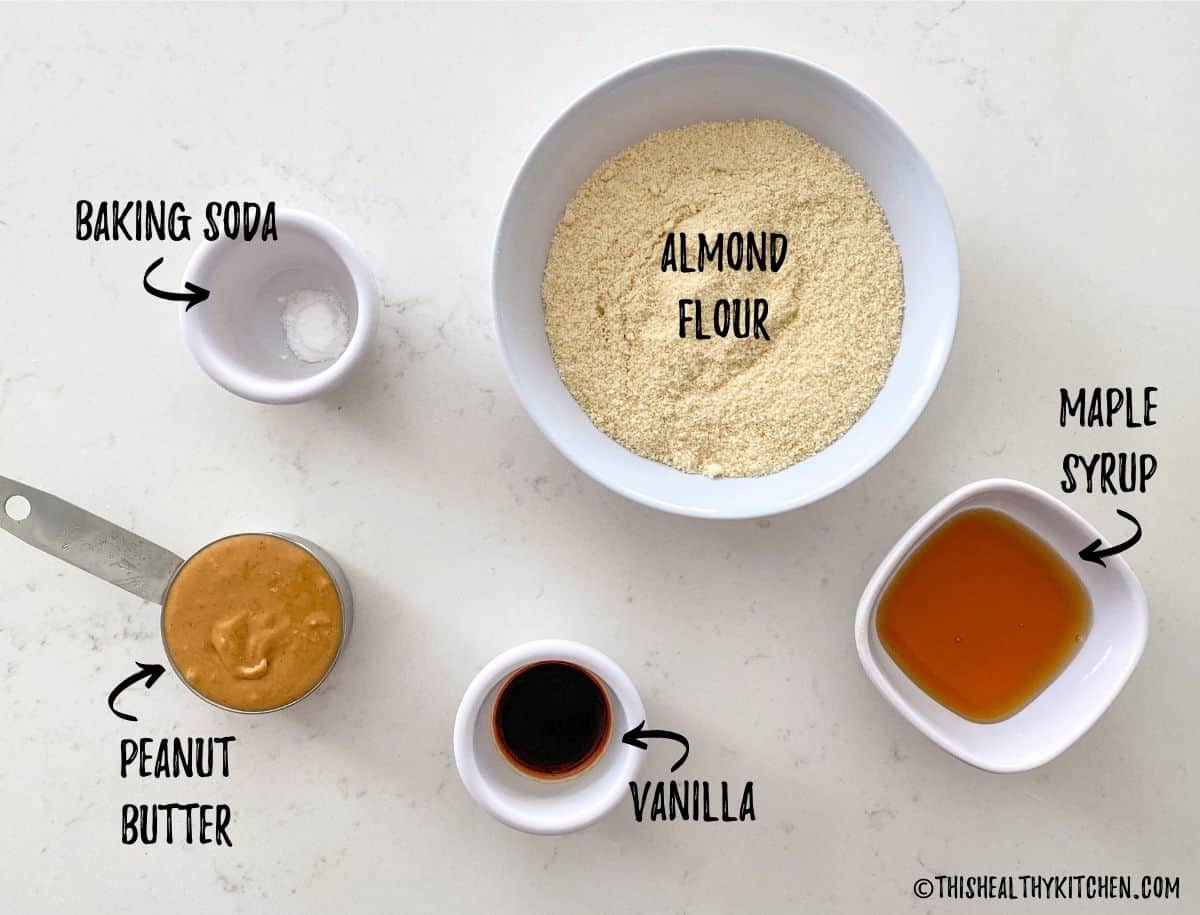 Bowl of flour, maple syrup, vanilla, peanut butter and baking soda.
