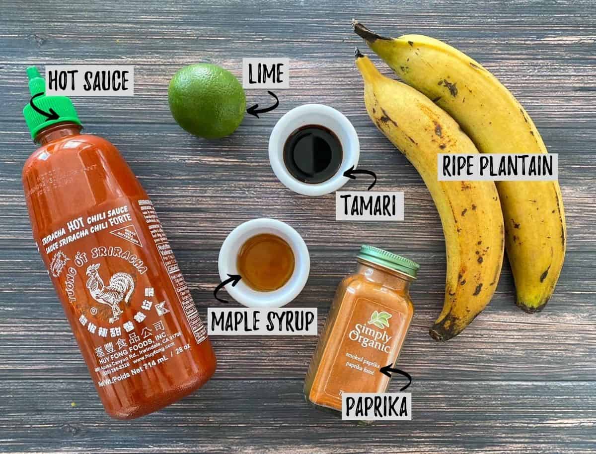 Ingredients to make air fryer plantains on brown deck.