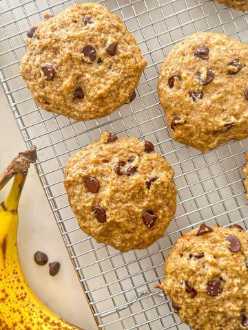 Banana chocolate chip cookies on wire rack.