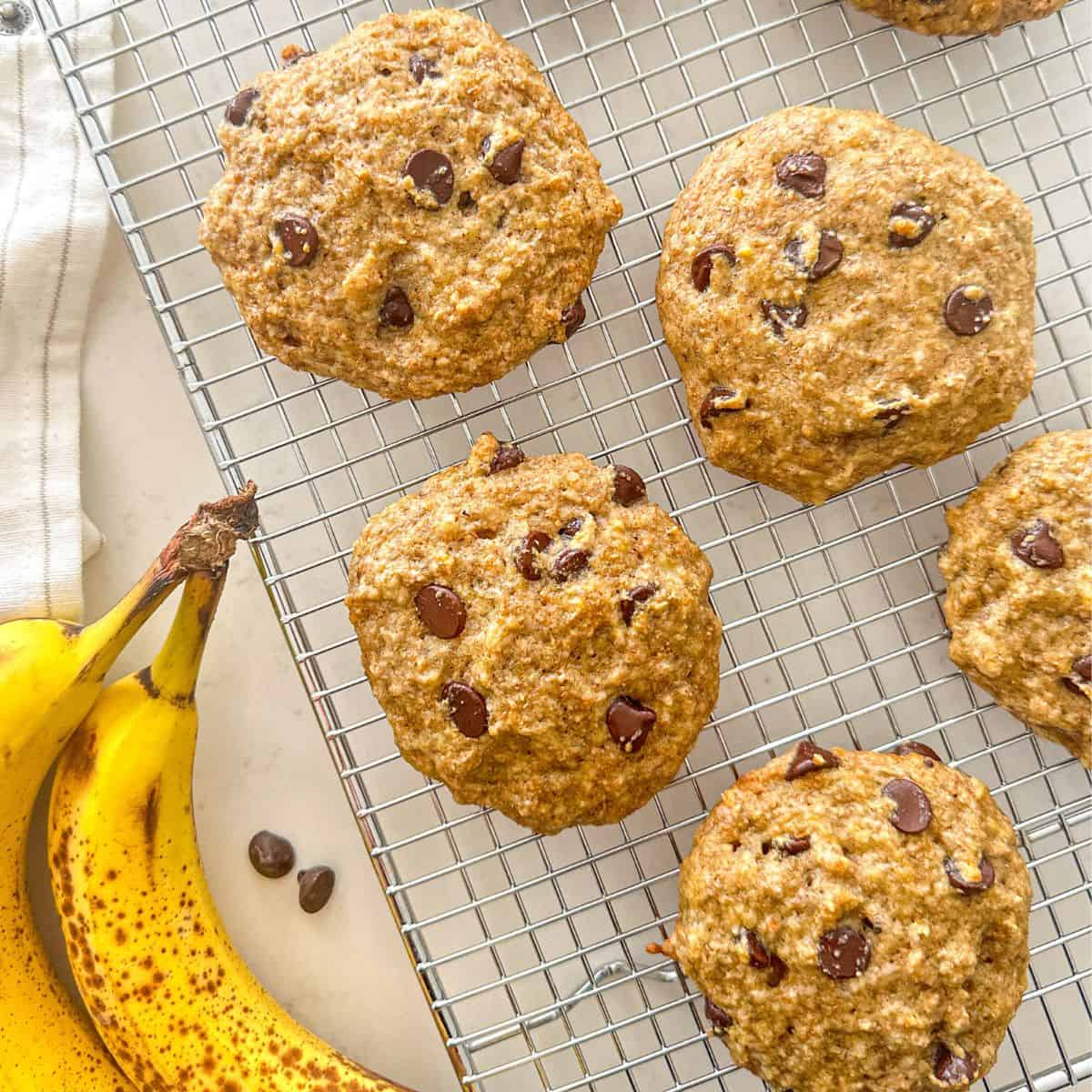 Banana chocolate chip cookies on wire rack.