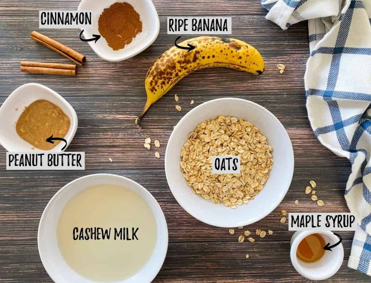 Ingredients to make banana overnight oats on brown deck.