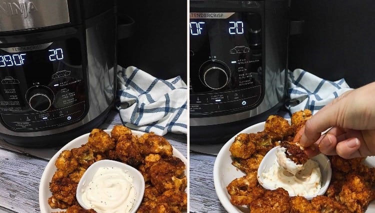 Air fryer in background with bowl of cauliflower florets in front and hand dipping one into ranch dip.
