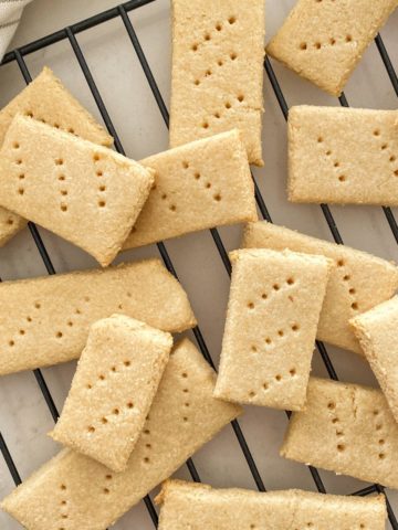 Close up of vegan shortbread cookies on cooling rack.
