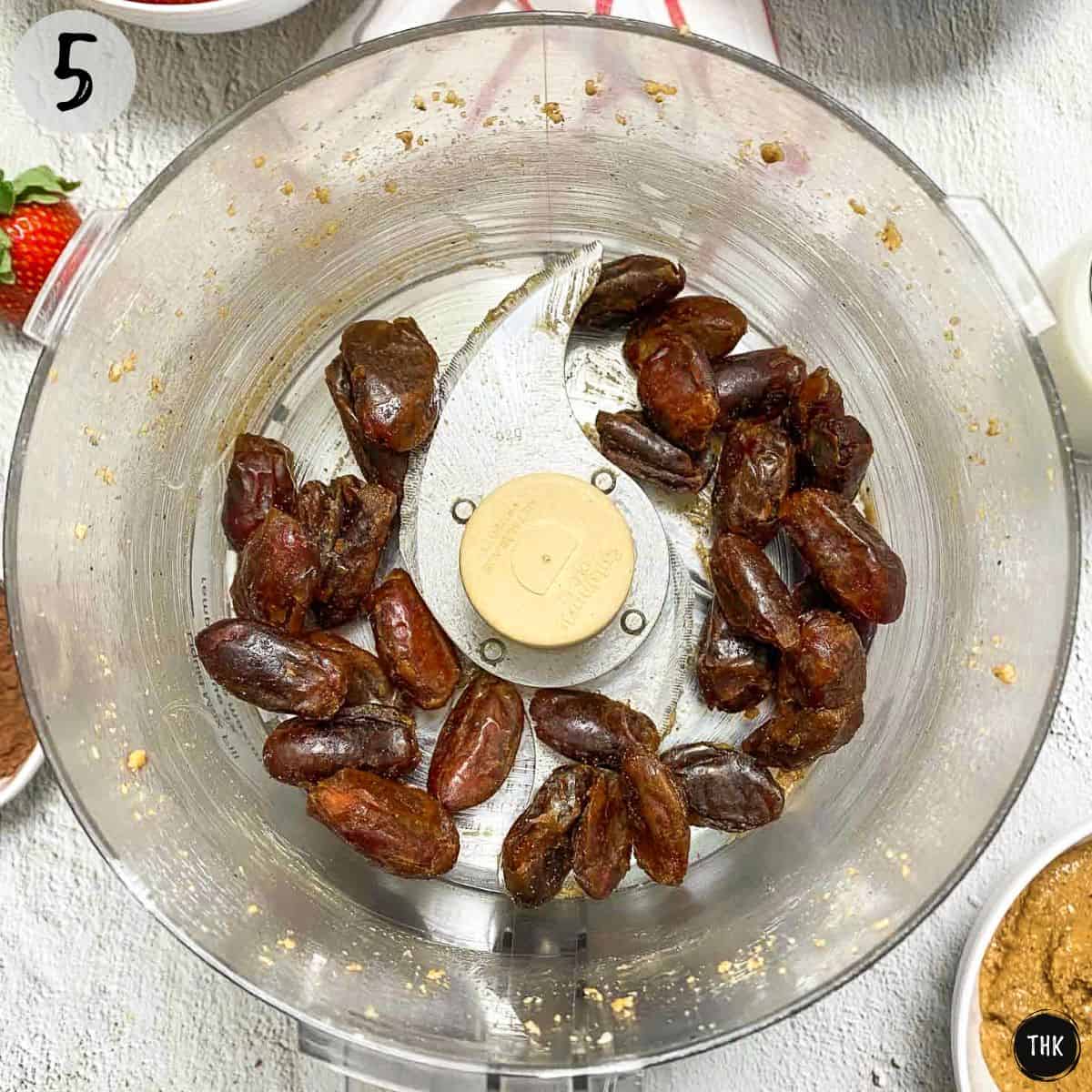 Dates inside food processor.
