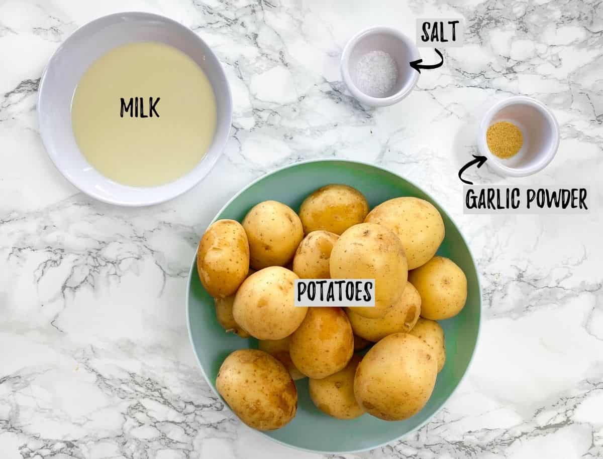 Bowls of ingredients needed to make mashed potato layer for shepherd's pie.