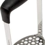 Potato masher on white background.