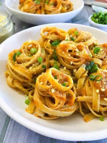 close up of fettuccini pasta in pumpkin sauce