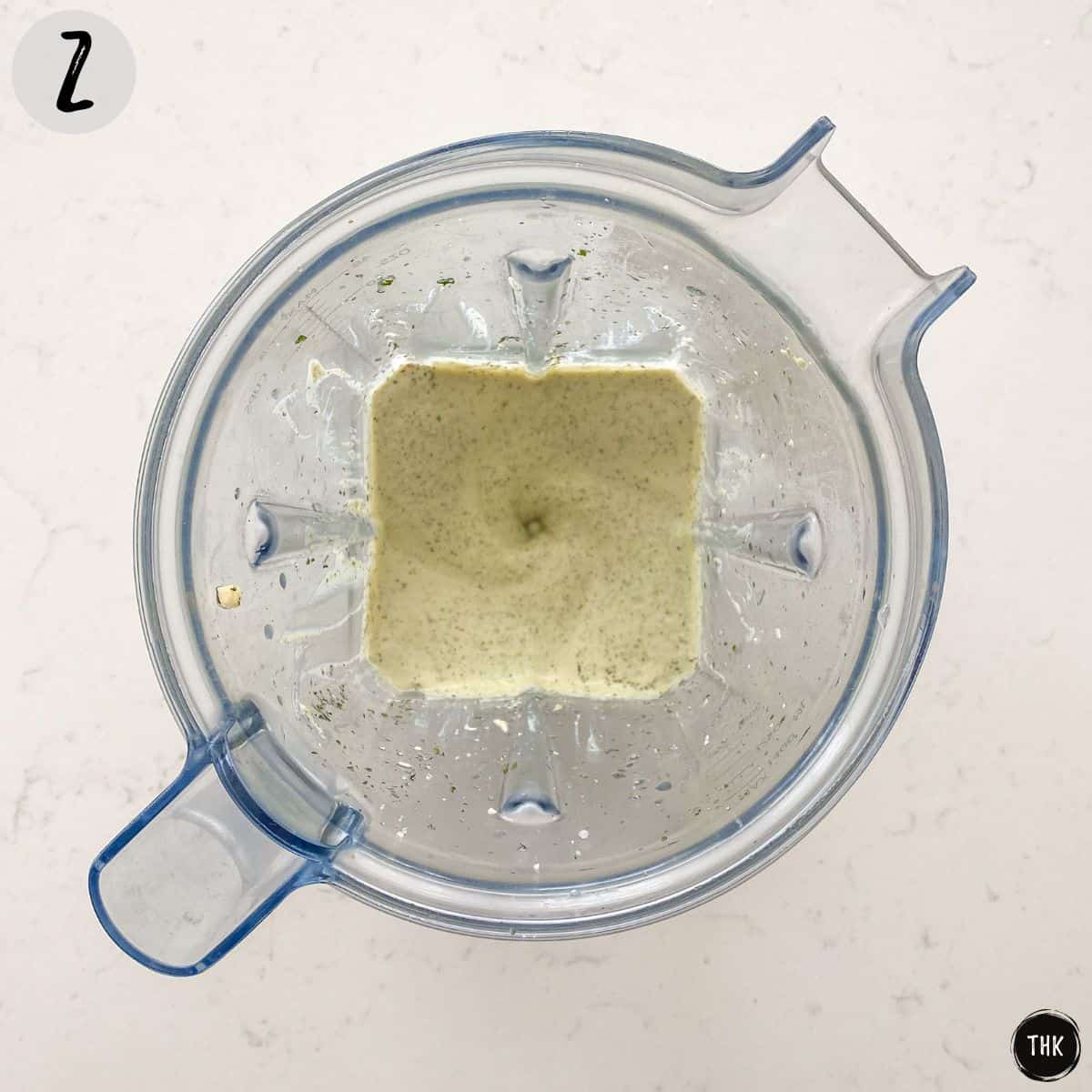 Creamy dip inside blender.