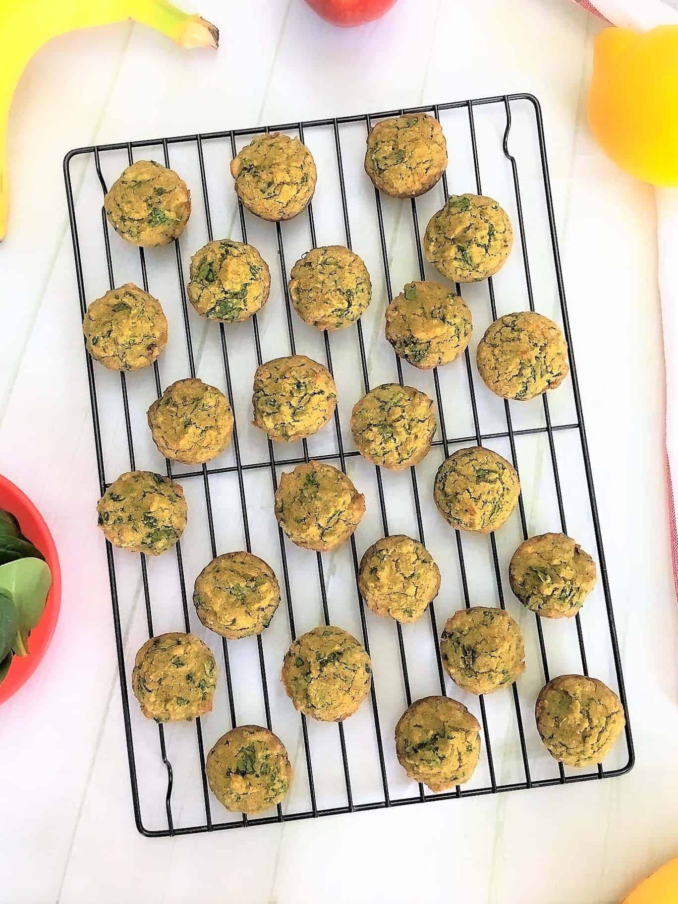 spinach banana muffins on cooling rack
