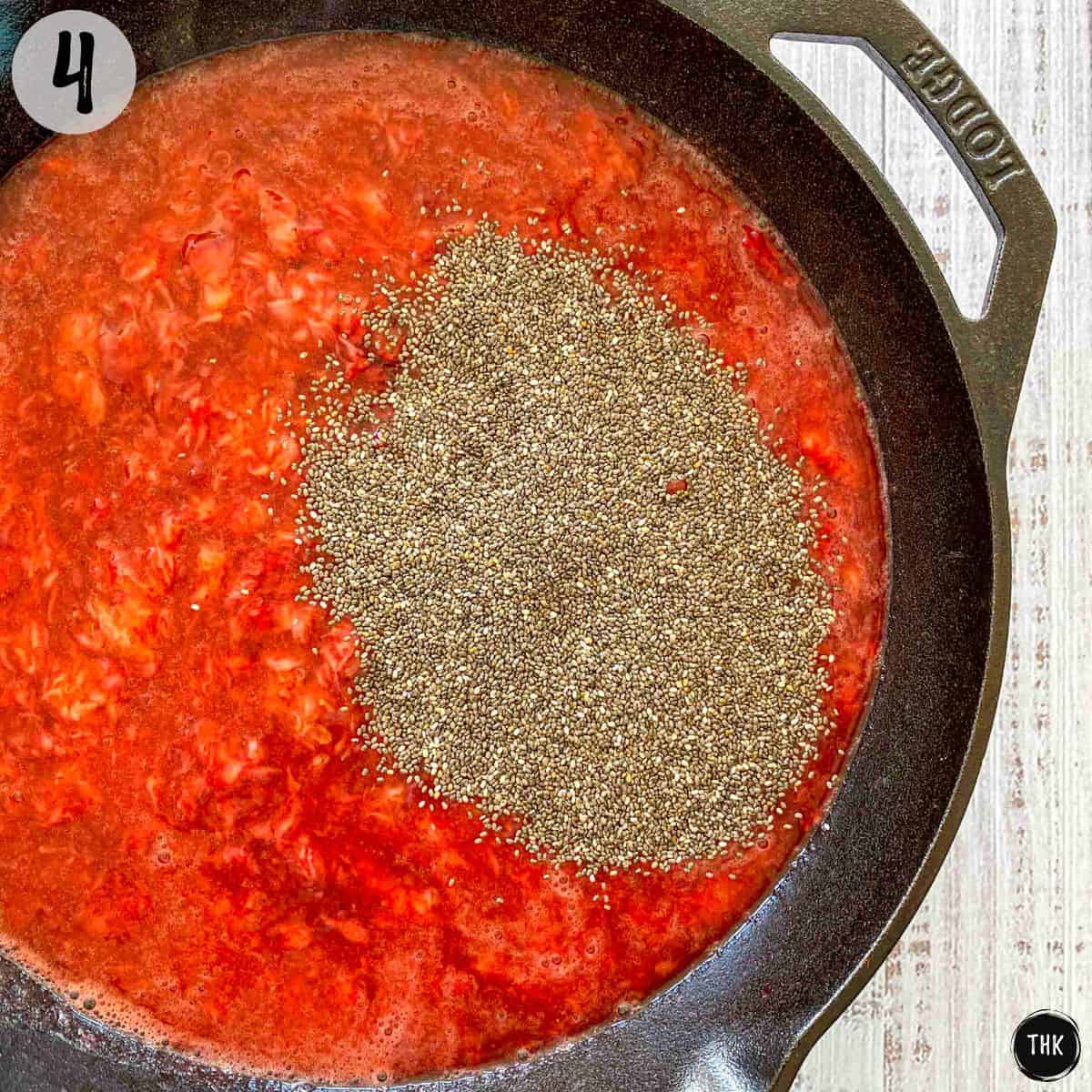 Strawberry jam with chia seeds on top.
