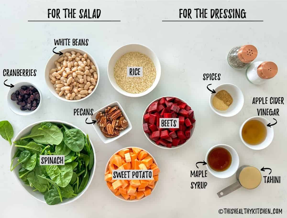 Ingredients needed for beet and sweet potato salad in prep bowls on kitchen counter.