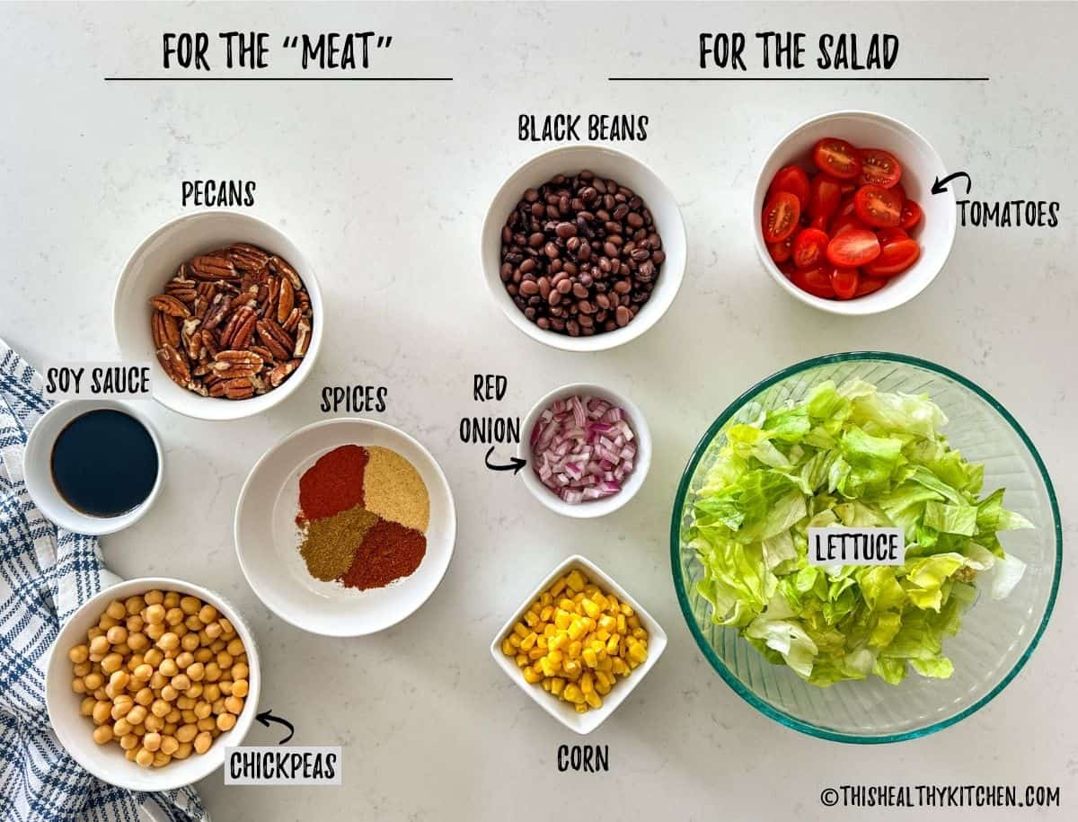 Ingredients to make vegan taco salad on kitchen countertop.