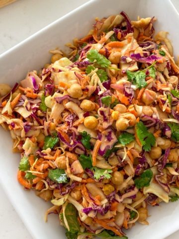 Coleslaw salad in large square serving bowl.