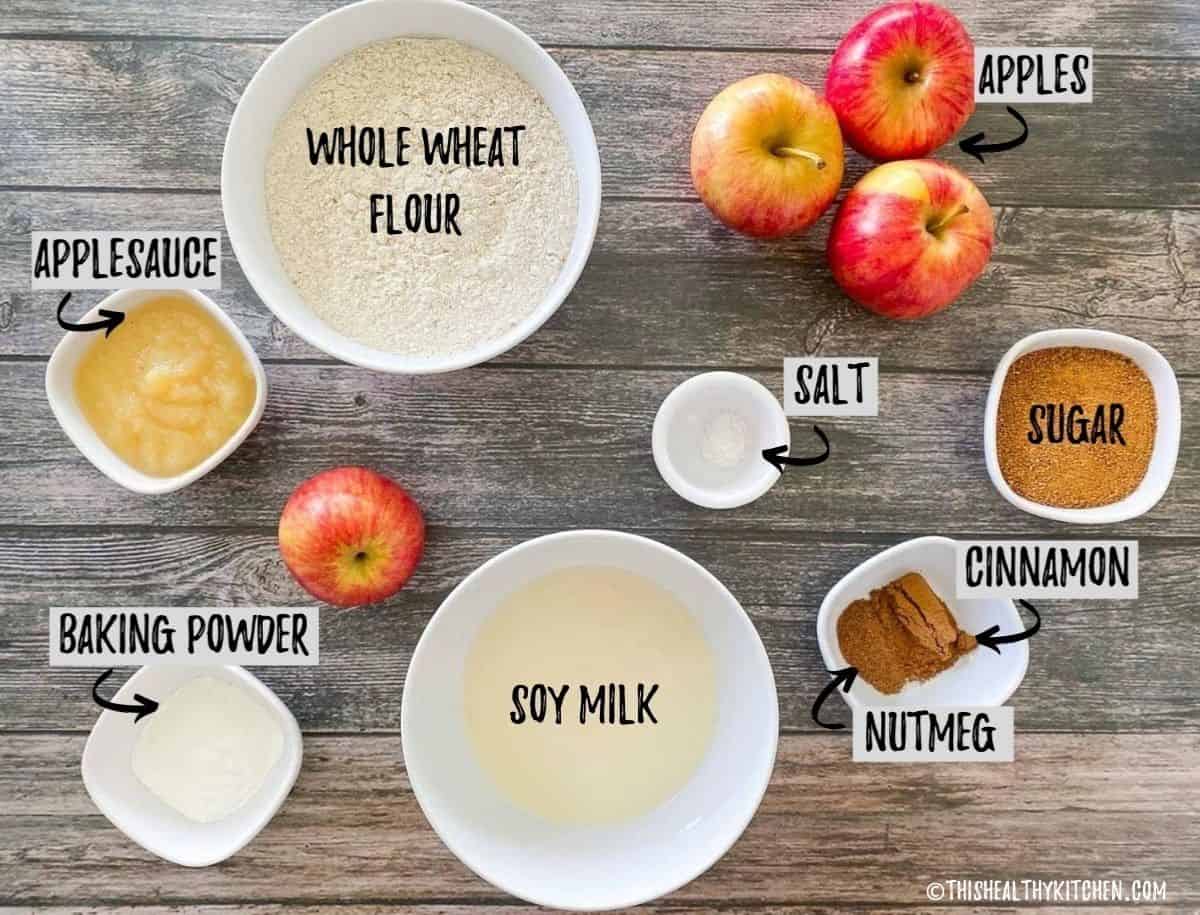 Ingredients to make apple bread in prep bowls on countertop.