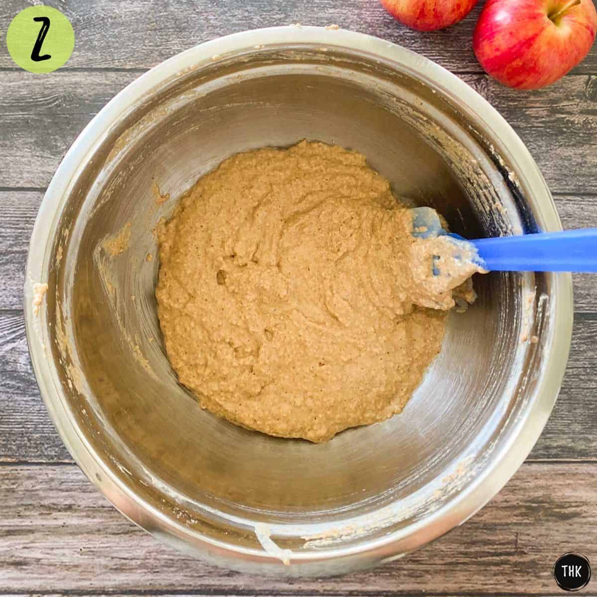 Cake batter inside large mixing bowl.