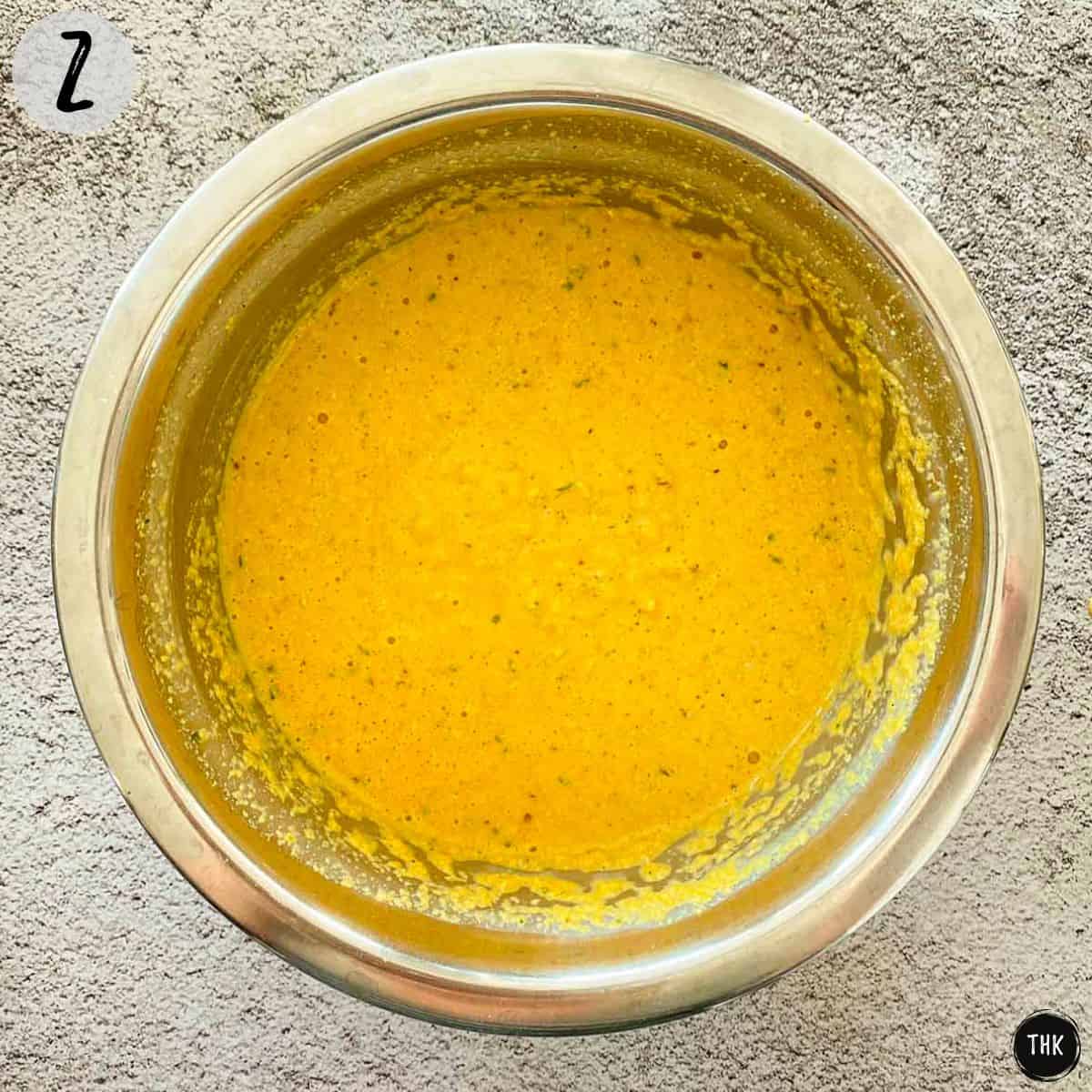 Bowl of chickpea flour batter.