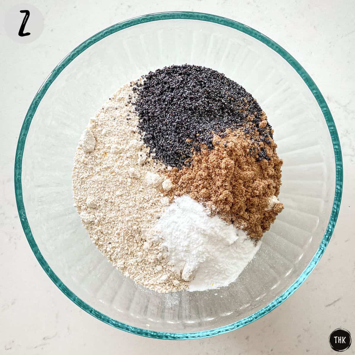 Flour, flax seed, poppy seeds and baking powder in large bowl.