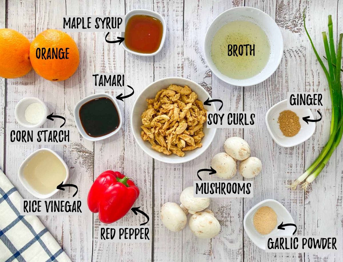 ingredients to make vegan orange chicken: orange, soy curls, broth, maple syrup, mushrooms, peppers, seasoning