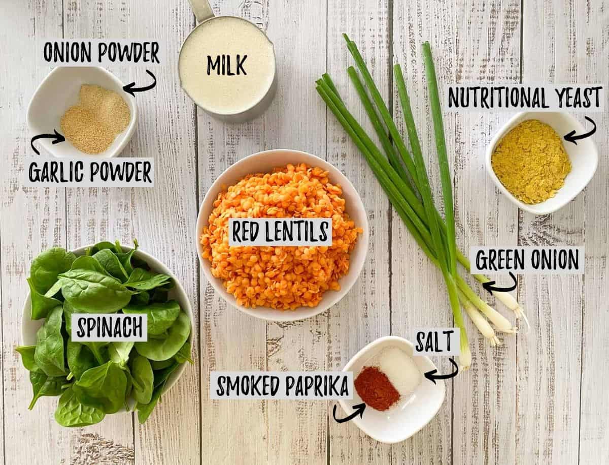 Ingredients to make lentil pancakes on grey deck.