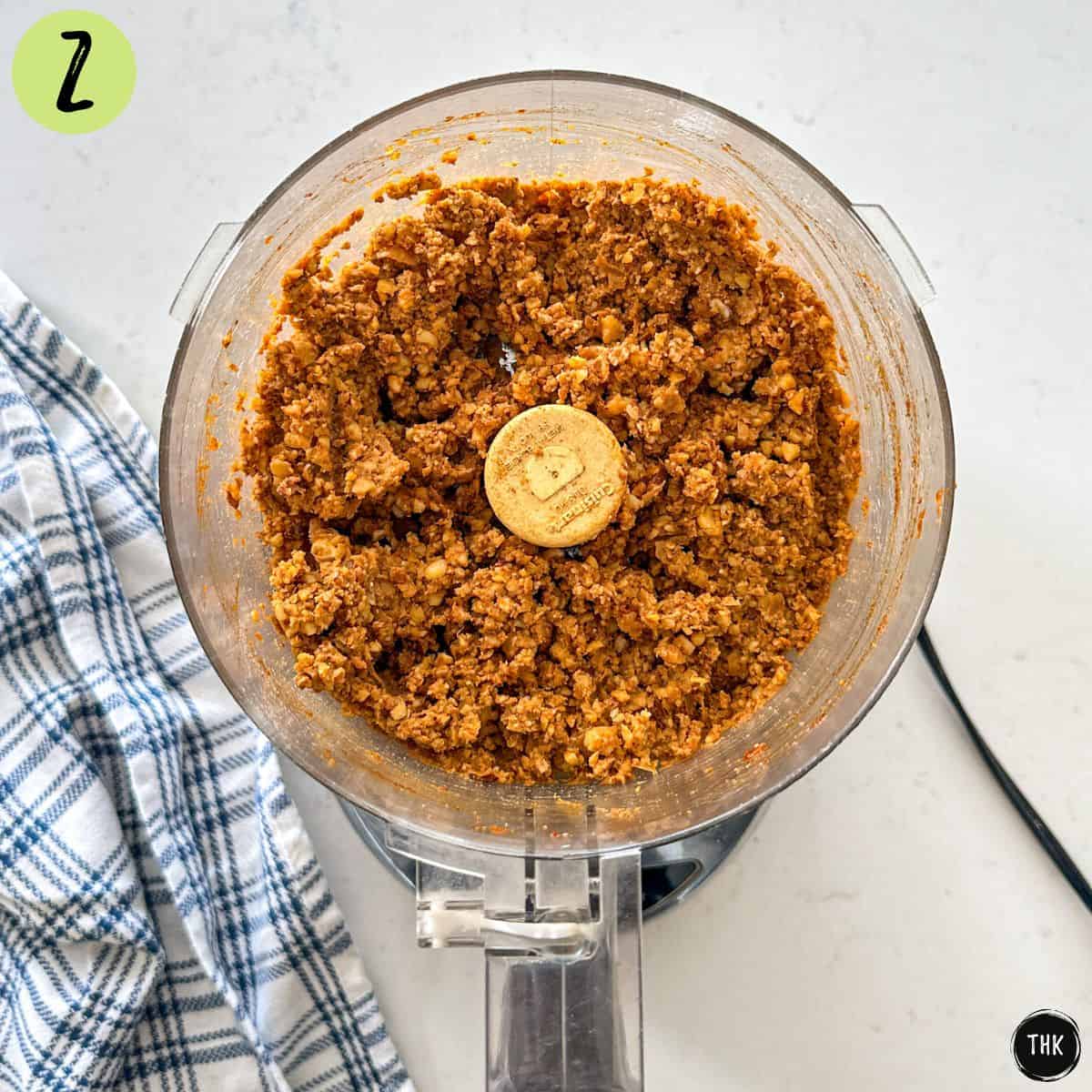 Vegan taco crumbles inside food processor.